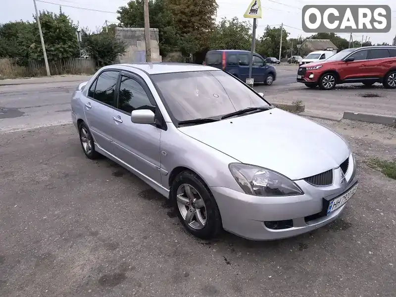 Седан Mitsubishi Lancer 2005 2 л. Ручная / Механика обл. Одесская, Подольск (Котовск) - Фото 1/9