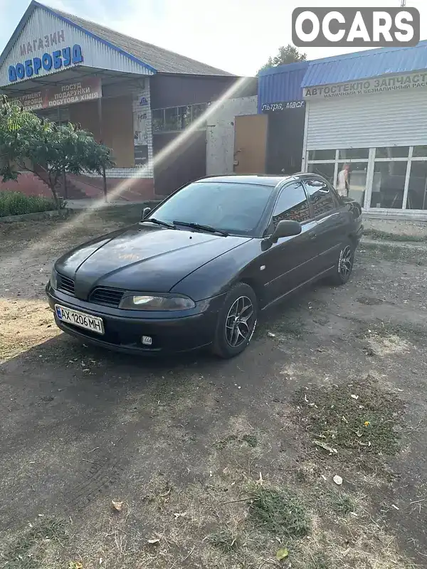 Седан Mitsubishi Carisma 2003 1.6 л. Ручная / Механика обл. Харьковская, Харьков - Фото 1/14