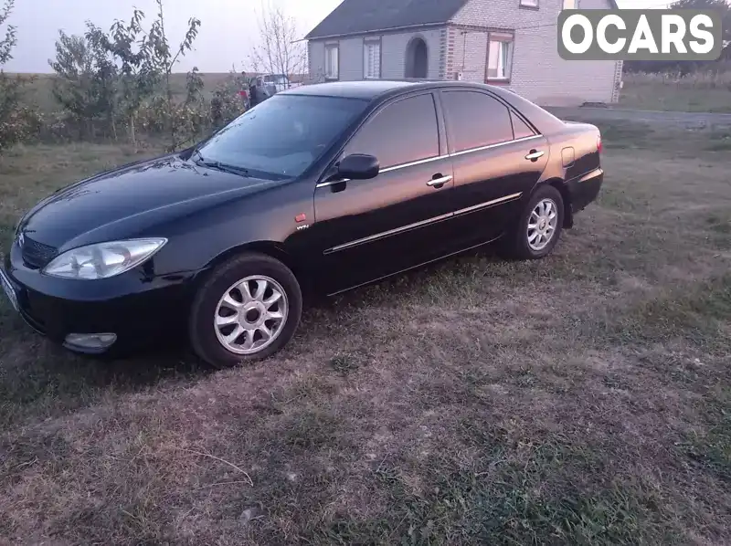 Седан Toyota Camry 2004 2.36 л. Автомат обл. Волинська, Луцьк - Фото 1/10