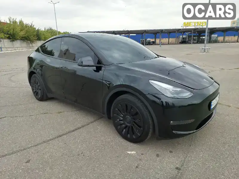 Внедорожник / Кроссовер Tesla Model Y 2023 null_content л. обл. Харьковская, Харьков - Фото 1/21