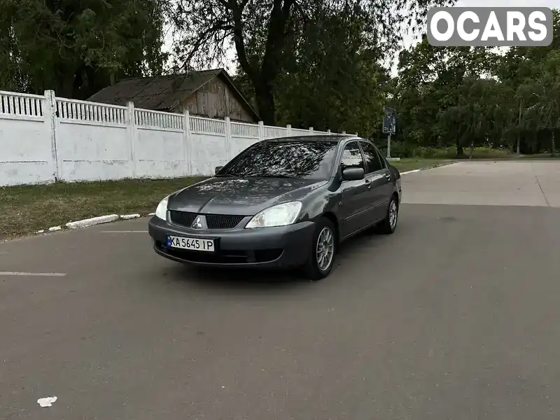 Седан Mitsubishi Lancer 2006 1.58 л. Ручна / Механіка обл. Чернігівська, Прилуки - Фото 1/9