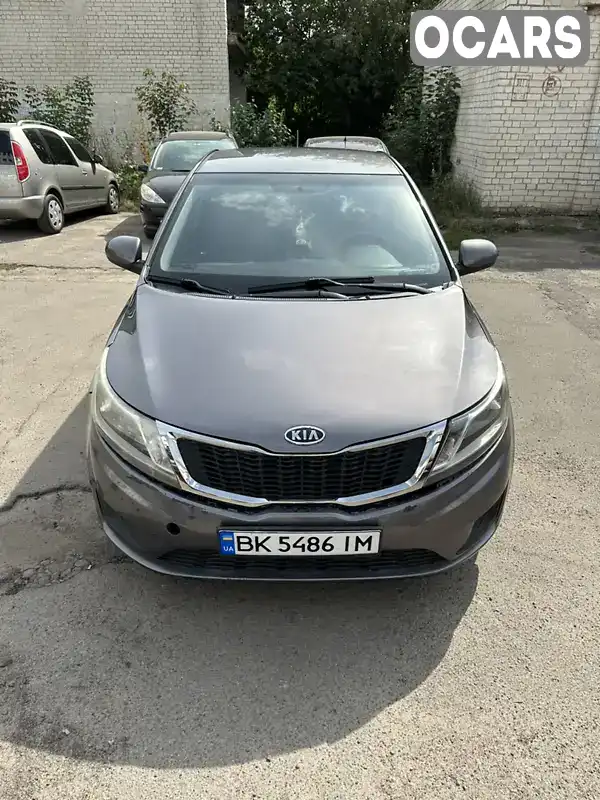 Седан Kia Rio 2014 1.4 л. Автомат обл. Рівненська, Рівне - Фото 1/11