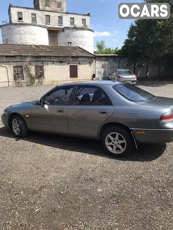 Седан Mazda 626 1995 2 л. Ручная / Механика обл. Запорожская, Запорожье - Фото 1/9