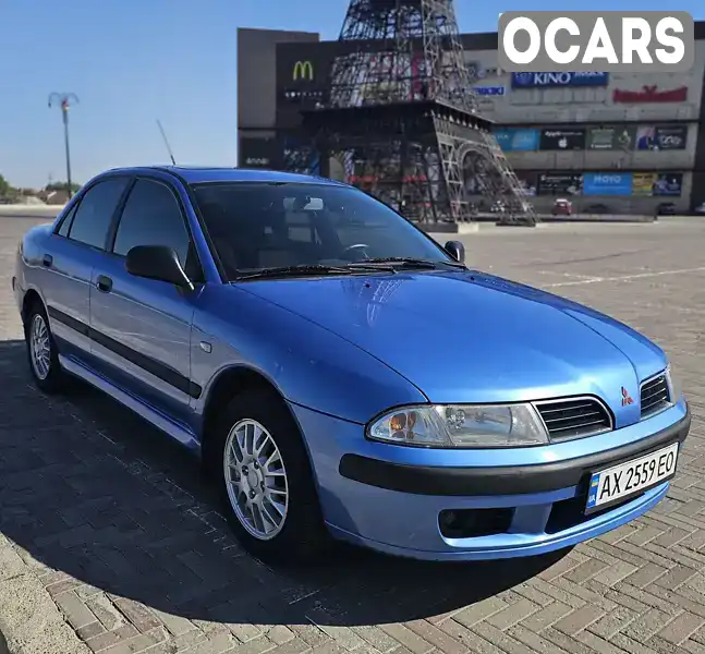 Седан Mitsubishi Carisma 2002 1.8 л. Ручна / Механіка обл. Харківська, Харків - Фото 1/20