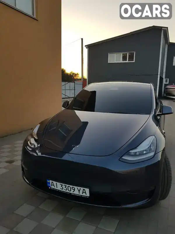 Внедорожник / Кроссовер Tesla Model Y 2023 null_content л. обл. Киевская, Киев - Фото 1/21