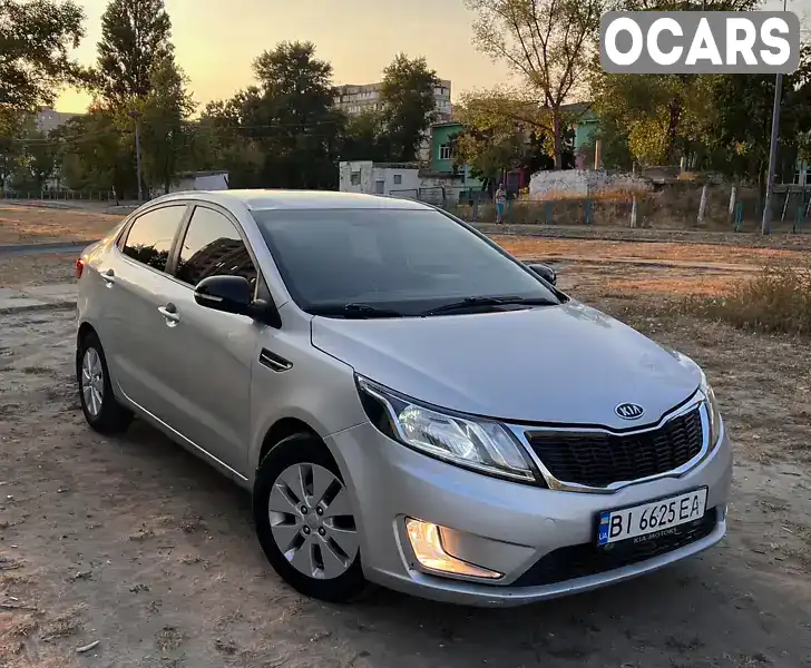 Седан Kia Rio 2012 1.59 л. обл. Харьковская, Харьков - Фото 1/21