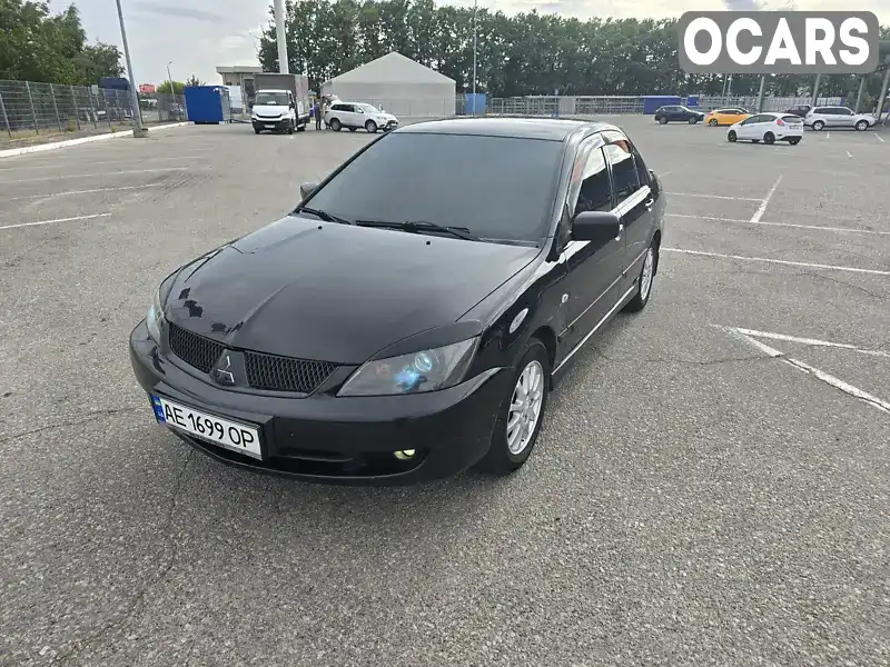 Седан Mitsubishi Lancer 2006 1.58 л. Ручна / Механіка обл. Дніпропетровська, Дніпро (Дніпропетровськ) - Фото 1/10