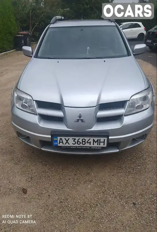 Позашляховик / Кросовер Mitsubishi Outlander 2008 2 л. Ручна / Механіка обл. Харківська, Харків - Фото 1/12