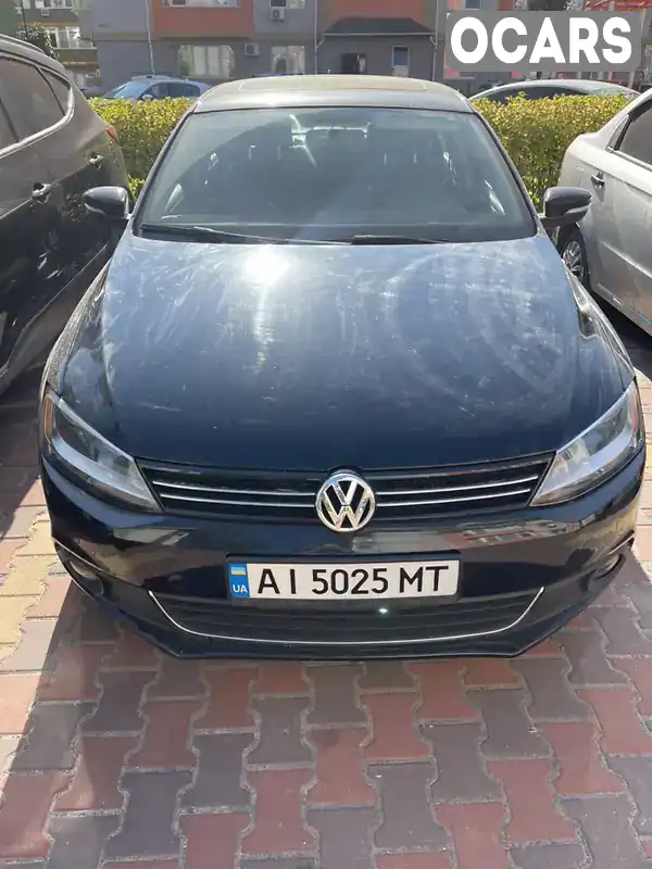 Седан Volkswagen Jetta 2013 1.8 л. Автомат обл. Киевская, location.city.hatne - Фото 1/12