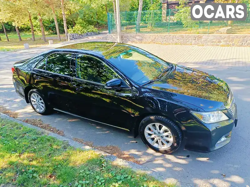 Седан Toyota Camry 2014 2.5 л. Автомат обл. Рівненська, Рівне - Фото 1/21