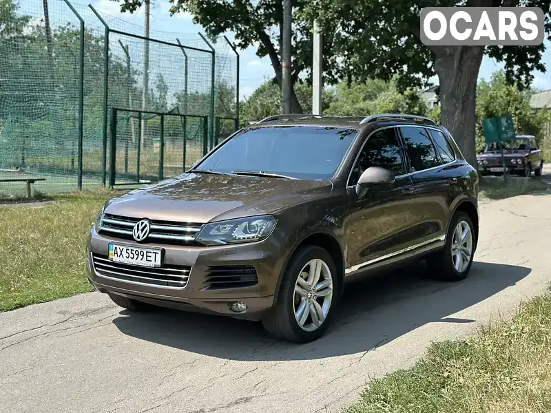 Внедорожник / Кроссовер Volkswagen Touareg 2013 3 л. Автомат обл. Харьковская, Харьков - Фото 1/21