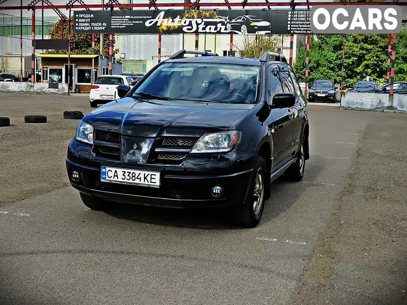 Позашляховик / Кросовер Mitsubishi Outlander 2004 2.35 л. Автомат обл. Черкаська, Черкаси - Фото 1/21