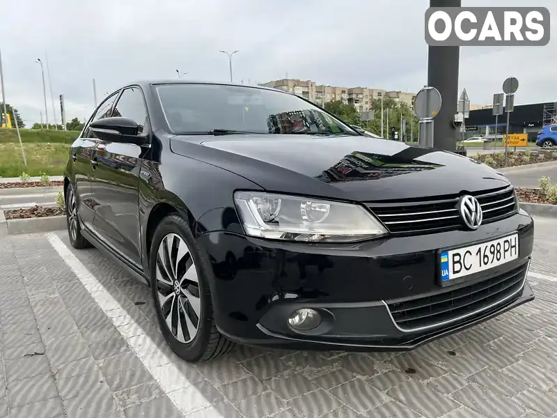 Седан Volkswagen Jetta 2014 1.4 л. Автомат обл. Львівська, Львів - Фото 1/21