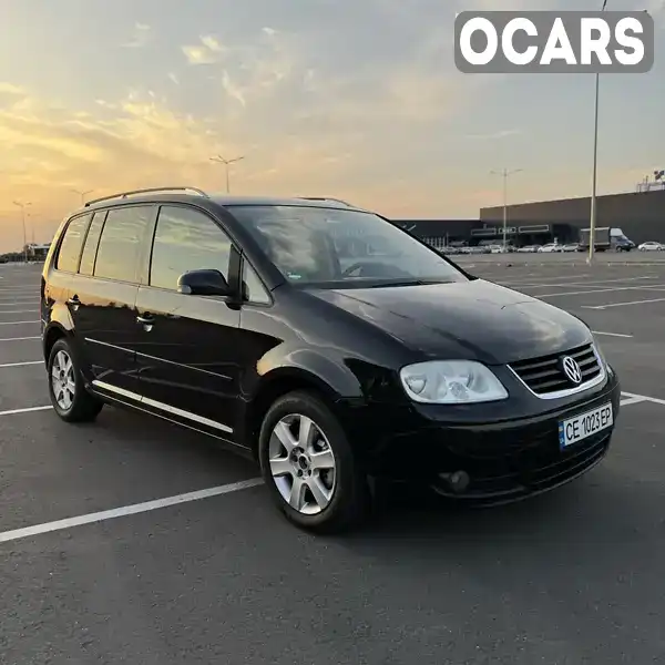 Мінівен Volkswagen Touran 2003 1.6 л. Ручна / Механіка обл. Чернівецька, Чернівці - Фото 1/21