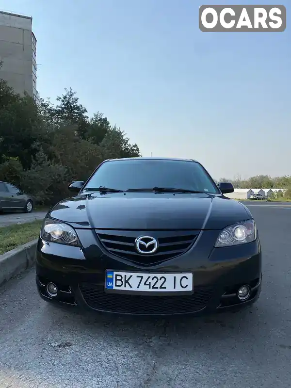 Седан Mazda 3 2004 2 л. Ручна / Механіка обл. Рівненська, Рівне - Фото 1/9