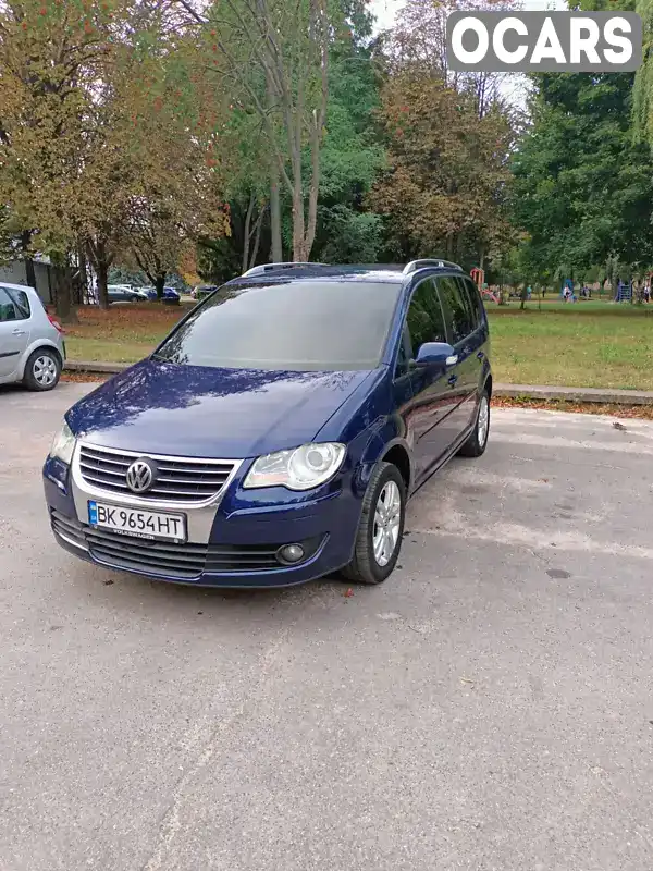 Мінівен Volkswagen Touran 2008 1.9 л. Ручна / Механіка обл. Рівненська, Рівне - Фото 1/21