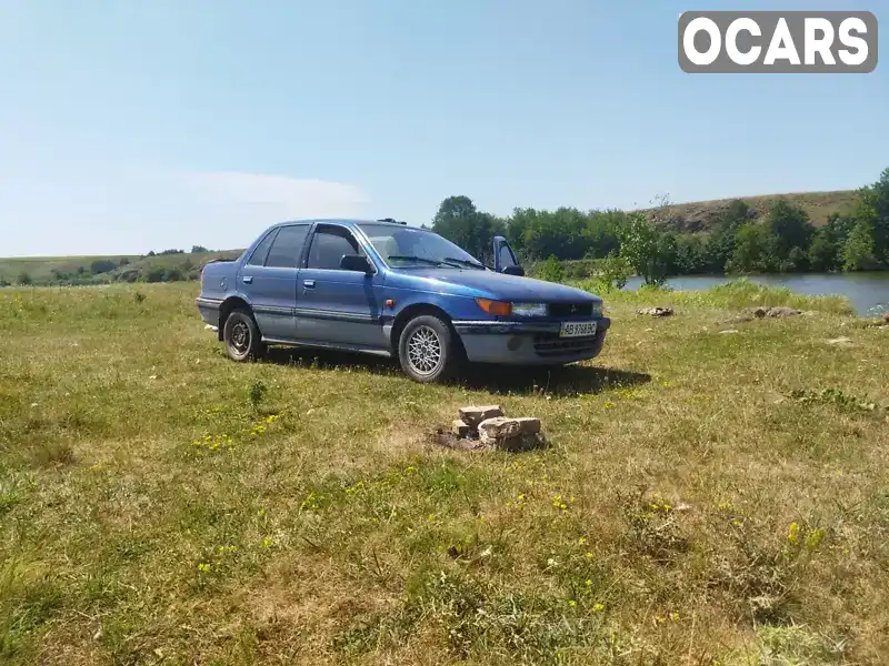 Седан Mitsubishi Lancer 1990 1.5 л. Ручная / Механика обл. Винницкая, Немиров - Фото 1/7