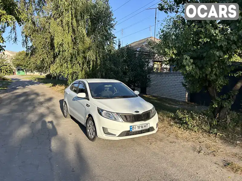 Седан Kia Rio 2012 1.4 л. Автомат обл. Полтавська, Кременчук - Фото 1/7