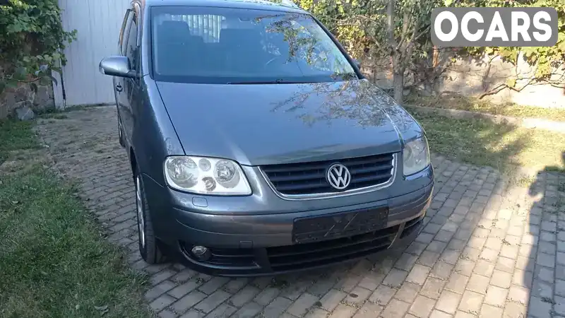 Минивэн Volkswagen Touran 2006 1.9 л. Автомат обл. Ивано-Франковская, Ивано-Франковск - Фото 1/21