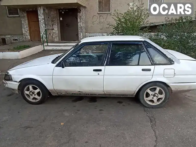 Седан Toyota Corolla 1987 1.3 л. Ручна / Механіка обл. Миколаївська, Миколаїв - Фото 1/7