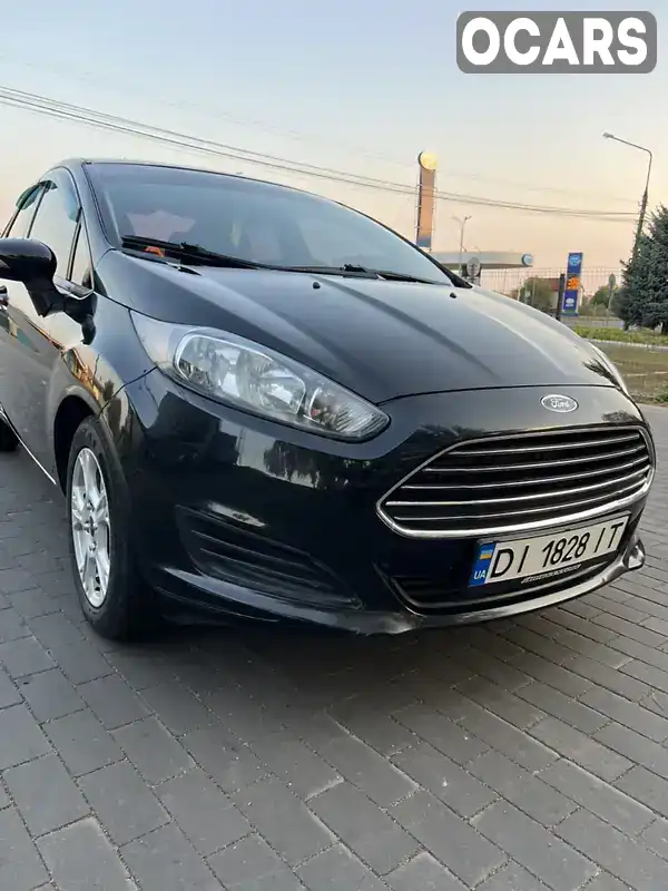 Седан Ford Fiesta 2014 1.6 л. Автомат обл. Полтавская, Миргород - Фото 1/17