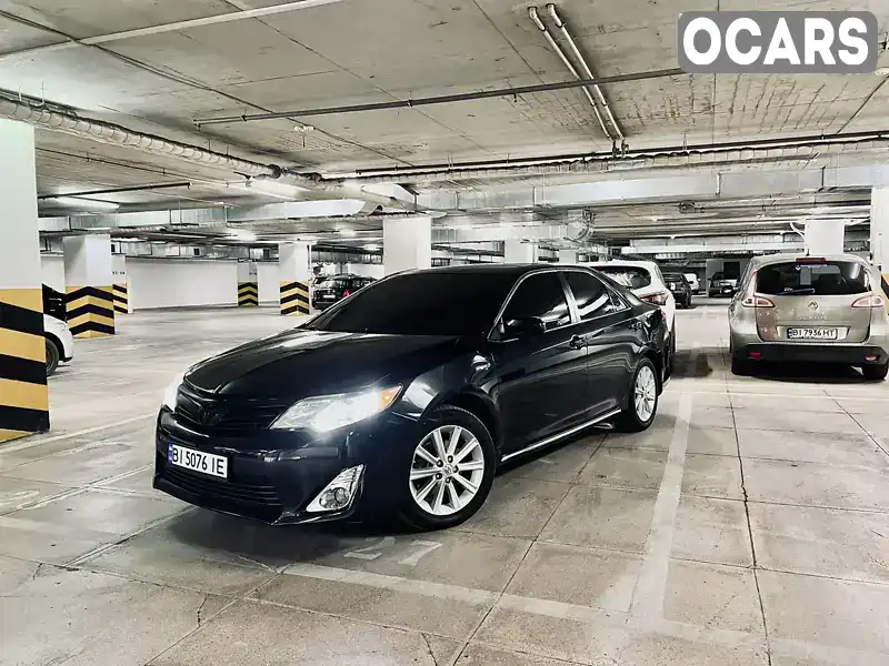 Седан Toyota Camry 2012 2.49 л. Варіатор обл. Полтавська, Полтава - Фото 1/21