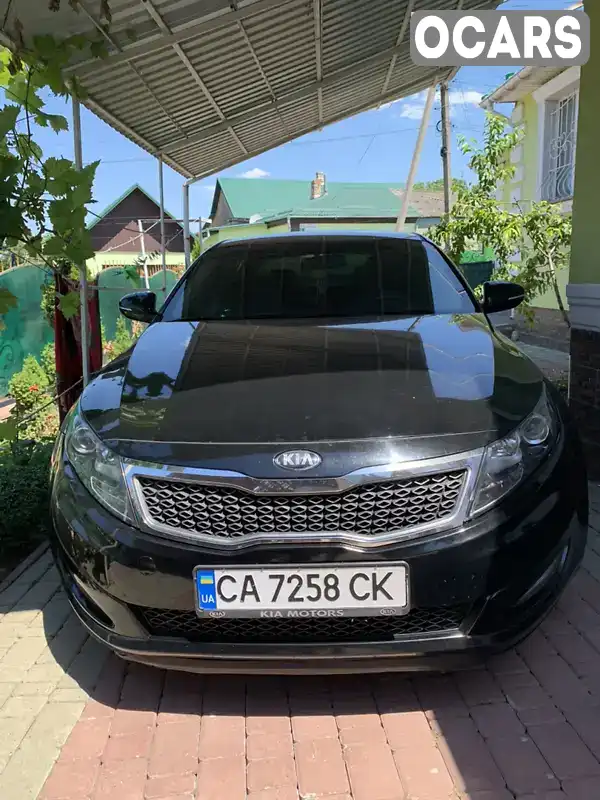 Седан Kia Optima 2014 2.36 л. Автомат обл. Черкасская, Тальное - Фото 1/10