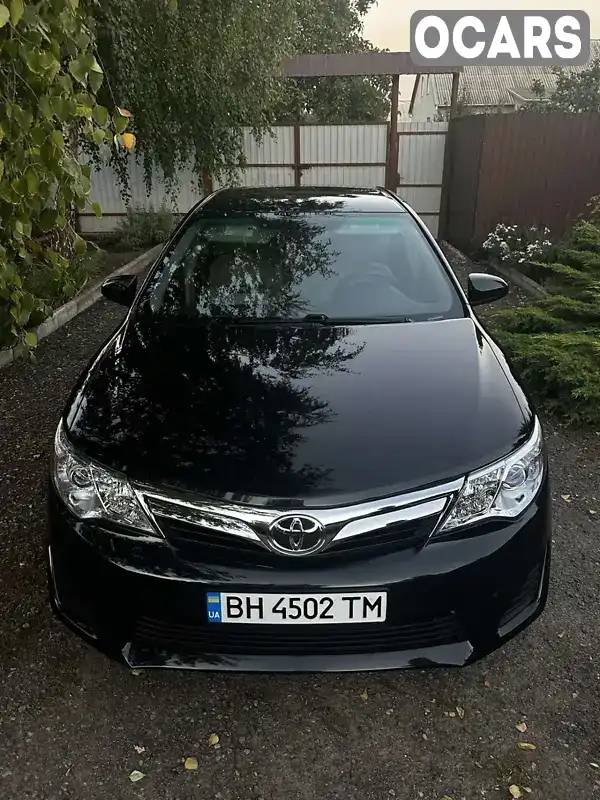 Седан Toyota Camry 2014 2.49 л. Автомат обл. Одеська, Роздільна - Фото 1/21