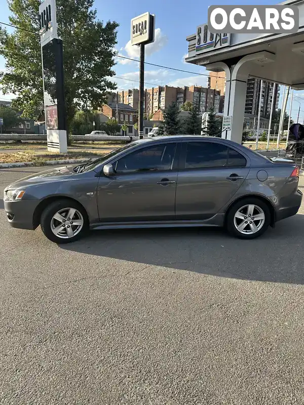 Седан Mitsubishi Lancer 2009 2 л. Вариатор обл. Харьковская, Харьков - Фото 1/21