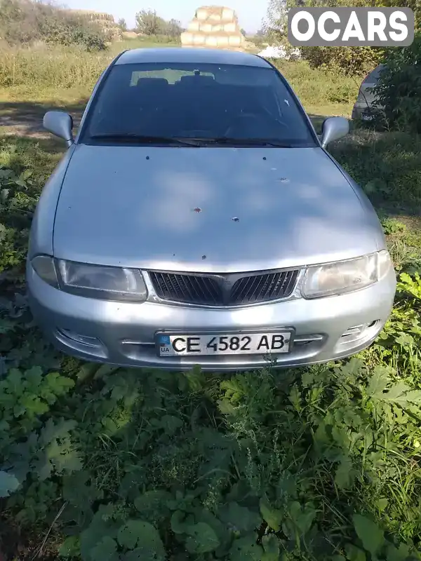 Седан Mitsubishi Carisma 1998 1.87 л. Ручна / Механіка обл. Чернівецька, Кіцмань - Фото 1/3