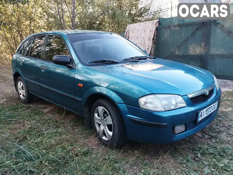 Хетчбек Mazda 323 1999 1.5 л. Ручна / Механіка обл. Житомирська, Житомир - Фото 1/17