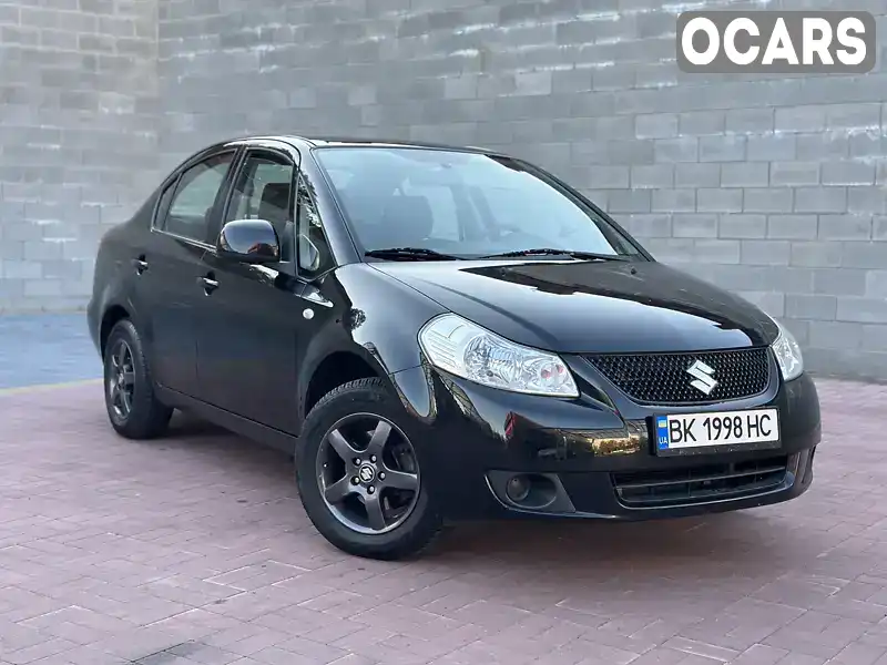 Седан Suzuki SX4 2010 1.6 л. Автомат обл. Рівненська, Рівне - Фото 1/21