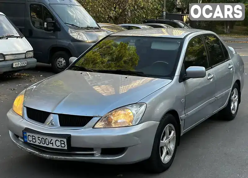 Седан Mitsubishi Lancer 2008 1.6 л. Ручна / Механіка обл. Київська, Київ - Фото 1/21