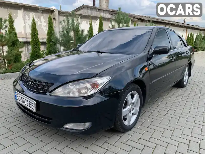 Седан Toyota Camry 2004 2.4 л. Автомат обл. Львовская, Золочев - Фото 1/14