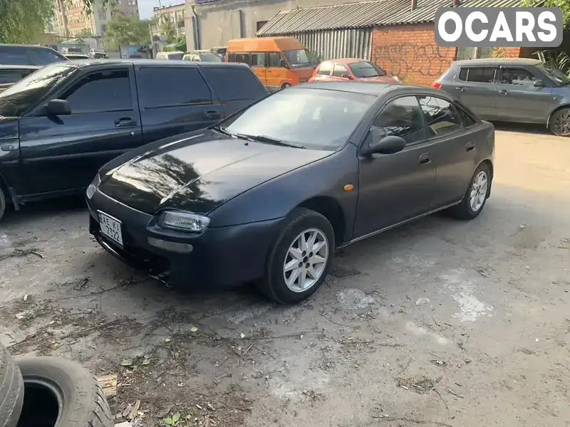 Хэтчбек Mazda 323 1994 1.49 л. обл. Днепропетровская, Днепр (Днепропетровск) - Фото 1/4