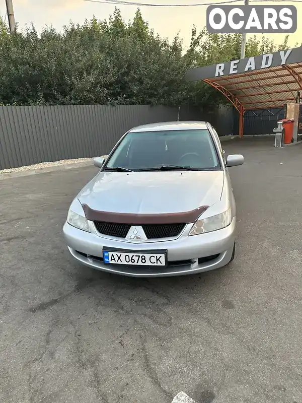 Седан Mitsubishi Lancer 2008 1.6 л. Ручна / Механіка обл. Харківська, Харків - Фото 1/21