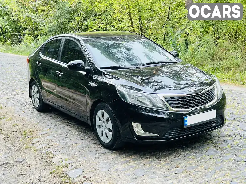 Седан Kia Rio 2013 1.4 л. Ручна / Механіка обл. Тернопільська, Кременець - Фото 1/21