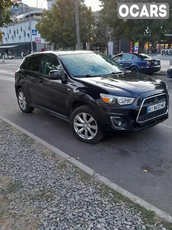 Внедорожник / Кроссовер Mitsubishi Outlander Sport 2013 2 л. Автомат обл. Киевская, Киев - Фото 1/15