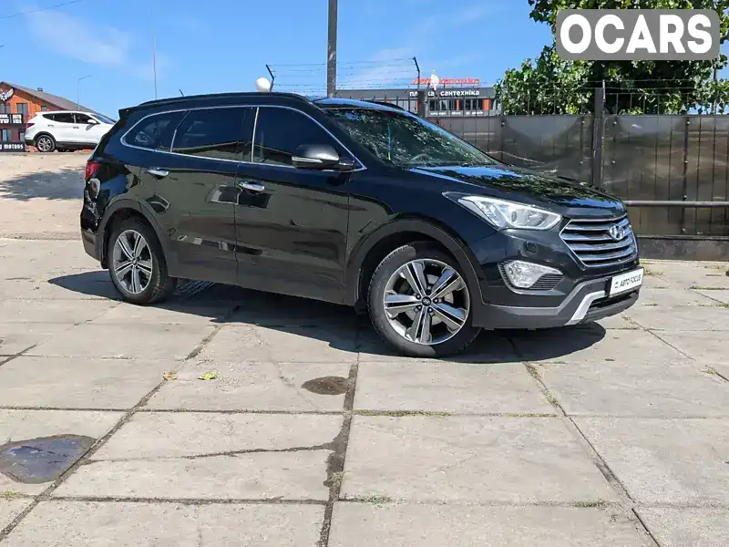 Позашляховик / Кросовер Hyundai Grand Santa Fe 2015 2.2 л. Автомат обл. Київська, Київ - Фото 1/21