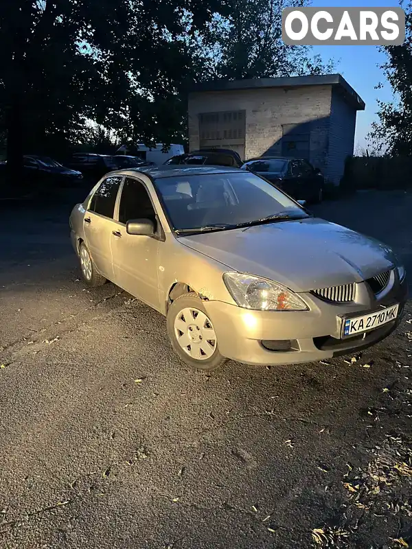 Седан Mitsubishi Lancer 2004 null_content л. Автомат обл. Киевская, Киев - Фото 1/13