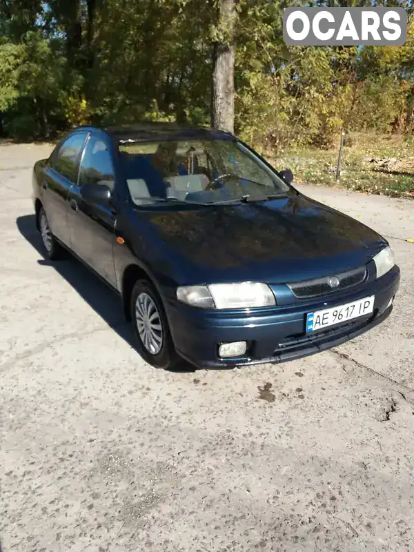 Седан Mazda 323 1998 1.49 л. Ручна / Механіка обл. Дніпропетровська, Марганець - Фото 1/20