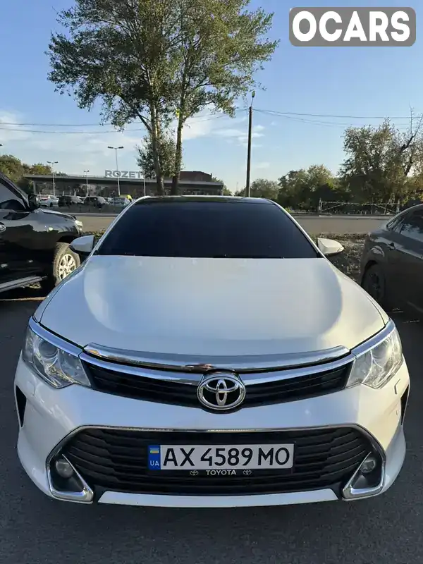 Седан Toyota Camry 2015 2.49 л. Автомат обл. Харьковская, Харьков - Фото 1/10