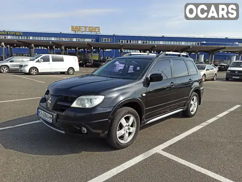 Позашляховик / Кросовер Mitsubishi Outlander 2007 2.4 л. Автомат обл. Київська, Київ - Фото 1/13