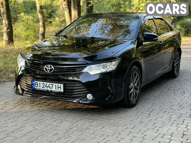 Седан Toyota Camry 2015 2.49 л. Автомат обл. Харківська, Харків - Фото 1/21