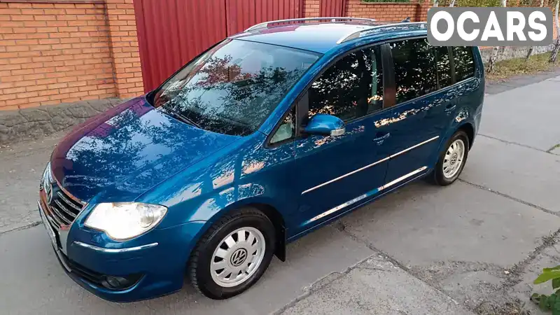 Мінівен Volkswagen Touran 2006 1.39 л. Ручна / Механіка обл. Миколаївська, Миколаїв - Фото 1/21