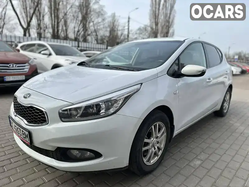 Хетчбек Kia Ceed 2013 1.6 л. Ручна / Механіка обл. Миколаївська, Миколаїв - Фото 1/21