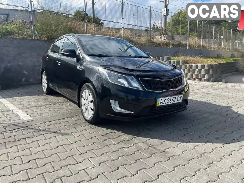 Седан Kia Rio 2012 1.59 л. Автомат обл. Харківська, Харків - Фото 1/21