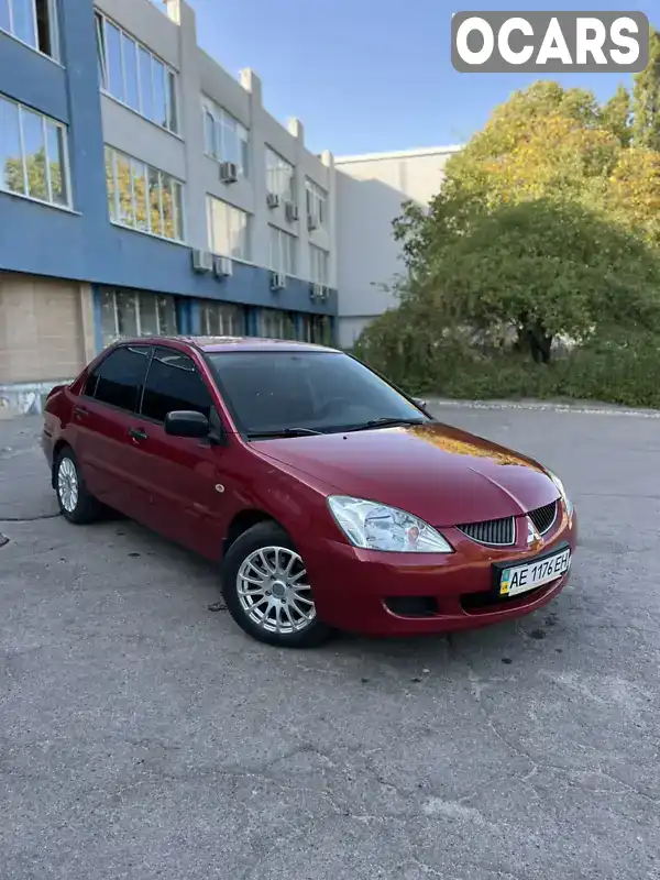 Седан Mitsubishi Lancer 2004 1.59 л. Ручна / Механіка обл. Дніпропетровська, Дніпро (Дніпропетровськ) - Фото 1/14