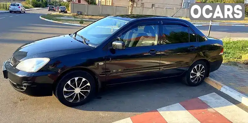 Седан Mitsubishi Lancer 2009 1.6 л. Автомат обл. Одесская, Одесса - Фото 1/21