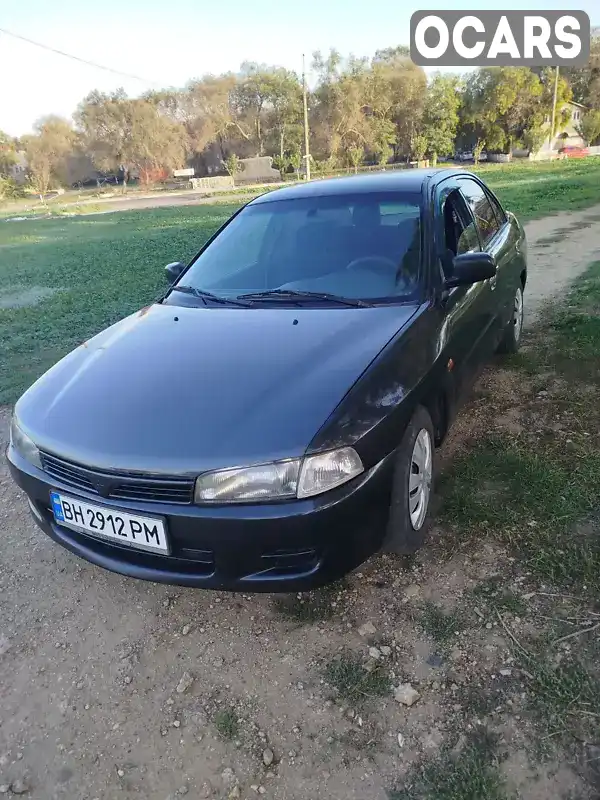 Седан Mitsubishi Lancer 1997 1.3 л. Ручна / Механіка обл. Одеська, Білгород-Дністровський - Фото 1/13